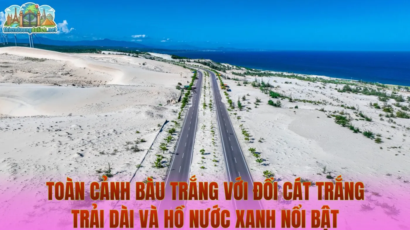 Toàn cảnh Bàu Trắng với đồi cát trắng trải dài và hồ nước xanh nổi bật